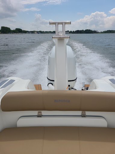 Boat underway showing wake on Lake Erie
